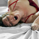 woman having orgasm with vibrator