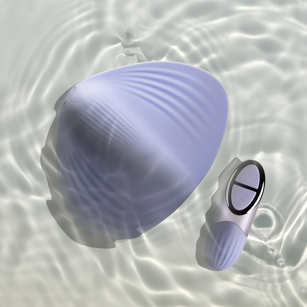 Niya N5 Vibrator and remote shown floating completely submerged in clear water